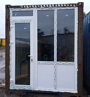Остекление металлического блок контейнера пластиковыми окнами WDS в Павлограде, входная пластиковая дверь WDS 404